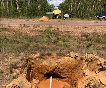 New 25mm water service project in progress, showcasing a freshly dug trench with visible pipeline and construction setup in a rural area.